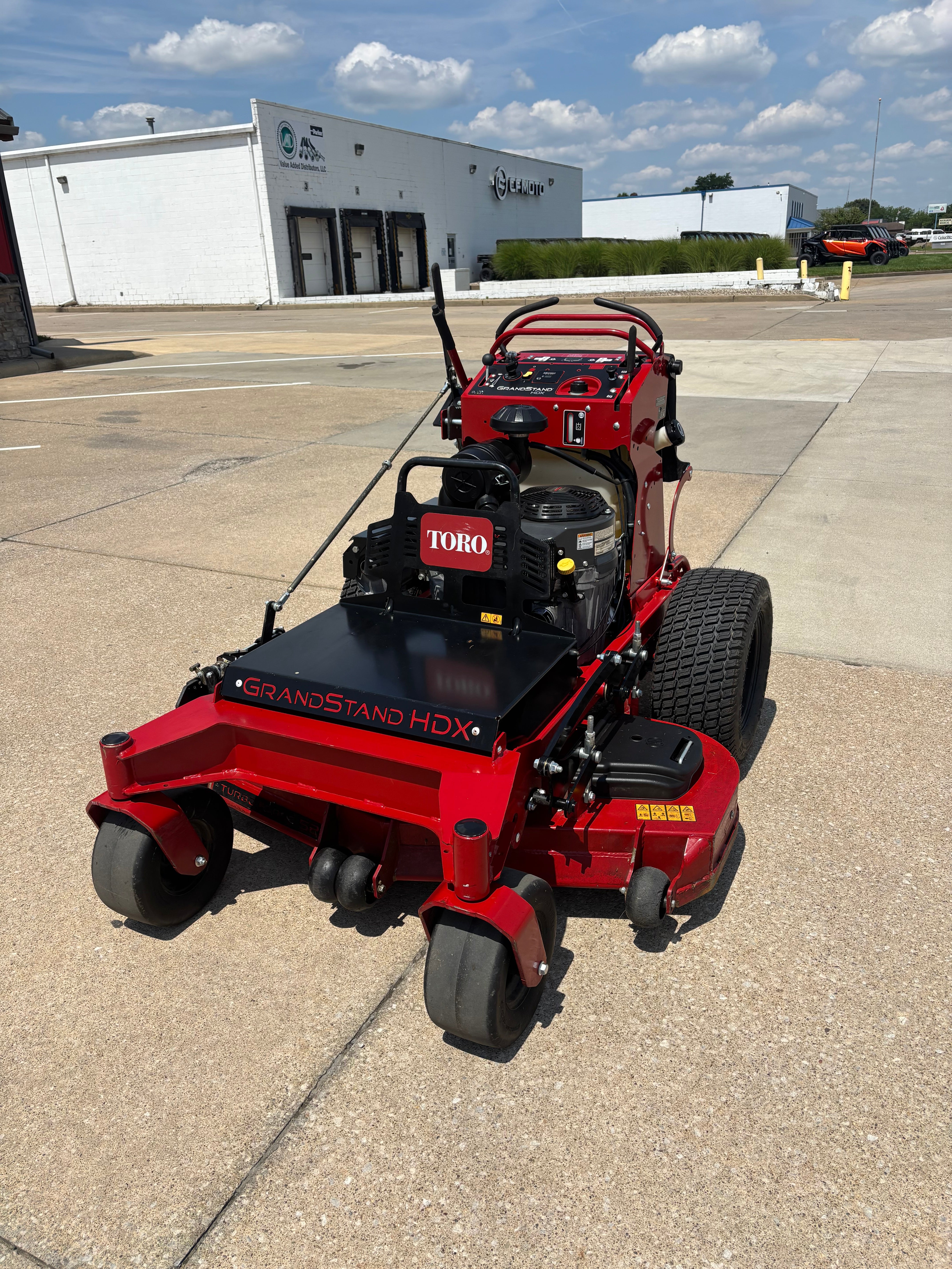 Used Toro Grandstand HDX 52-inch stand on mower