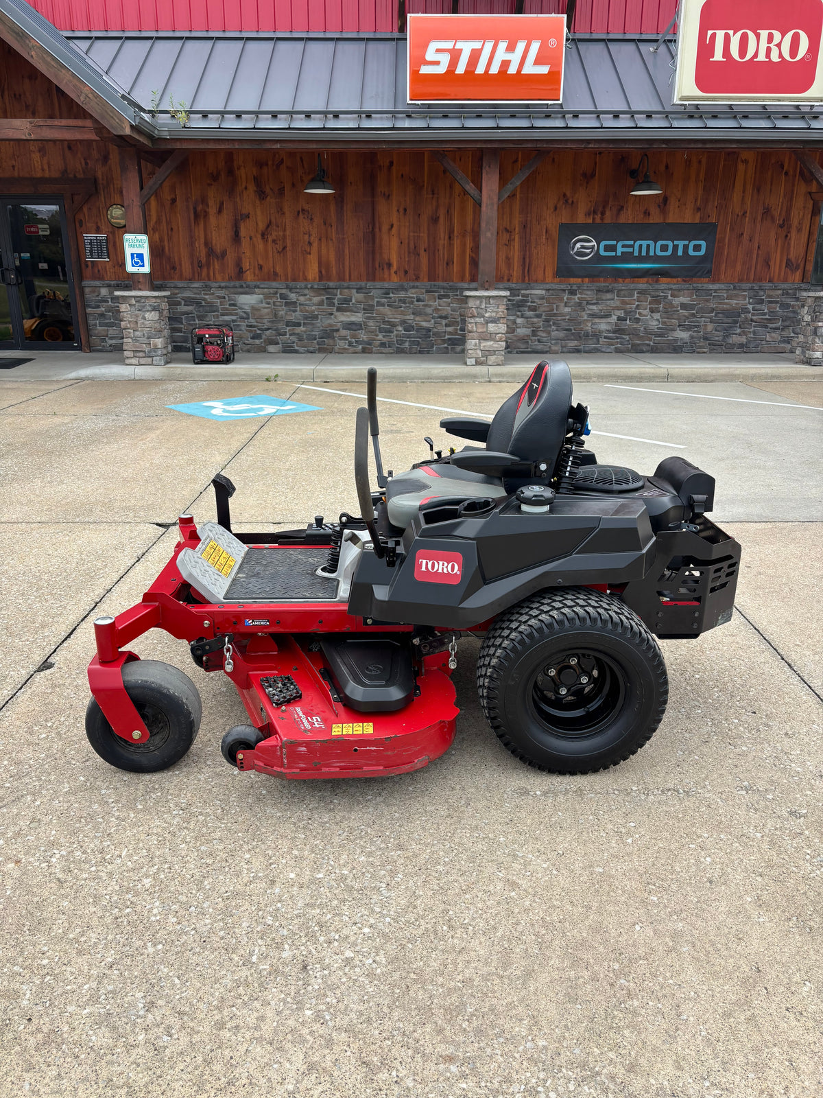 Used Toro Titan 54-inch zero-turn mower.