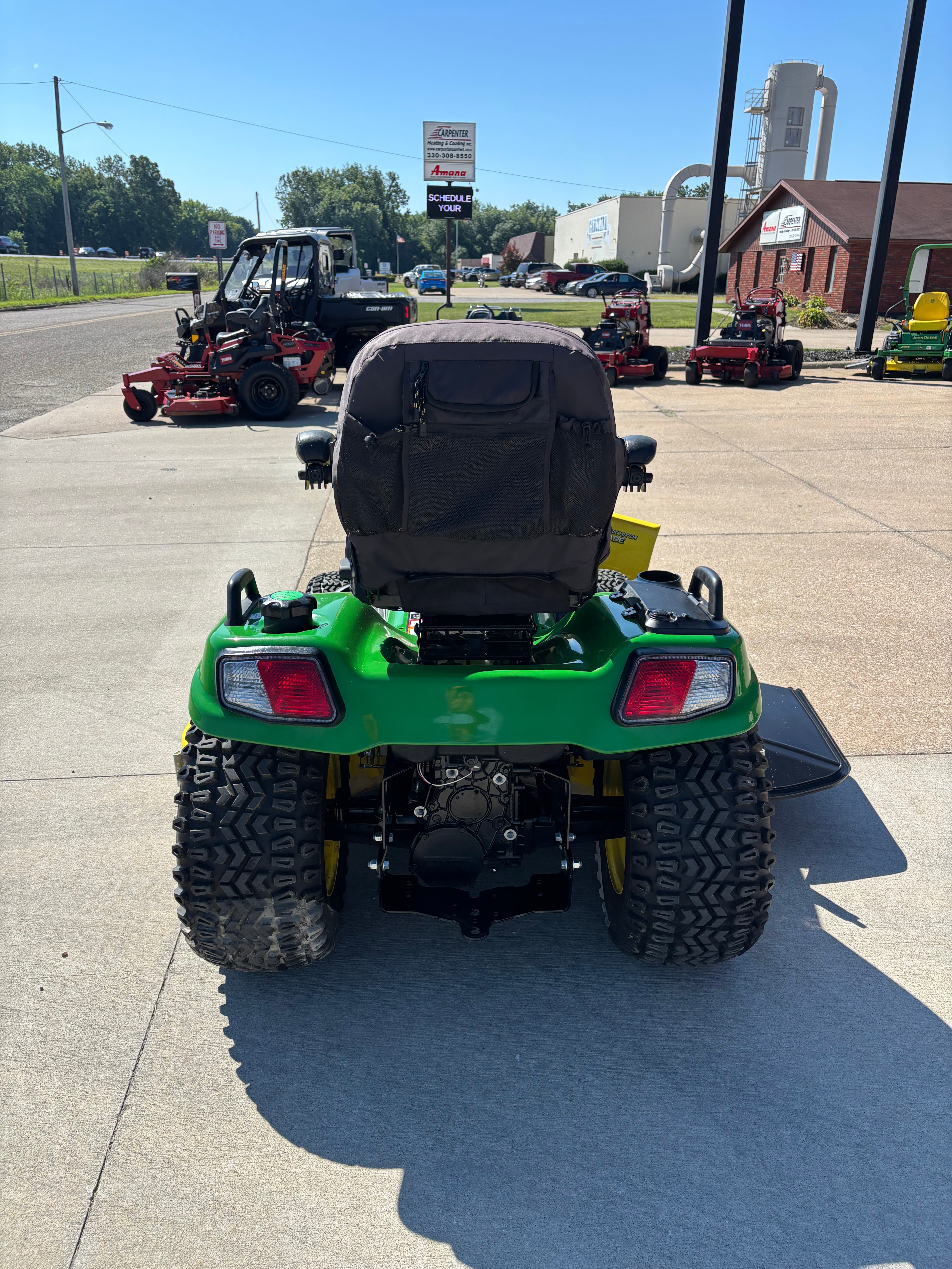 Used John Deere X758 four-wheel drive tractor