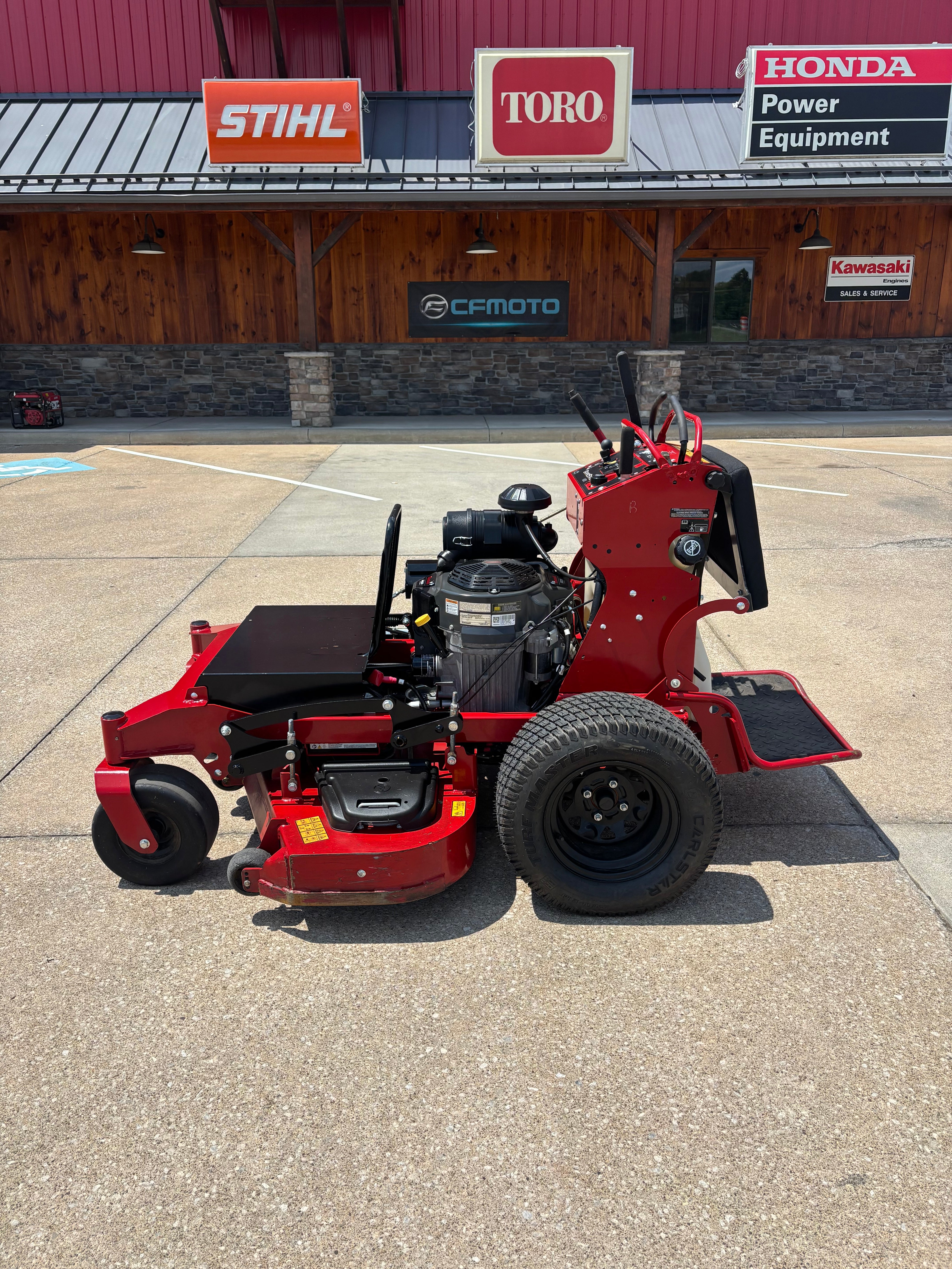 Used Toro Grandstand HDX 52-inch stand on mower