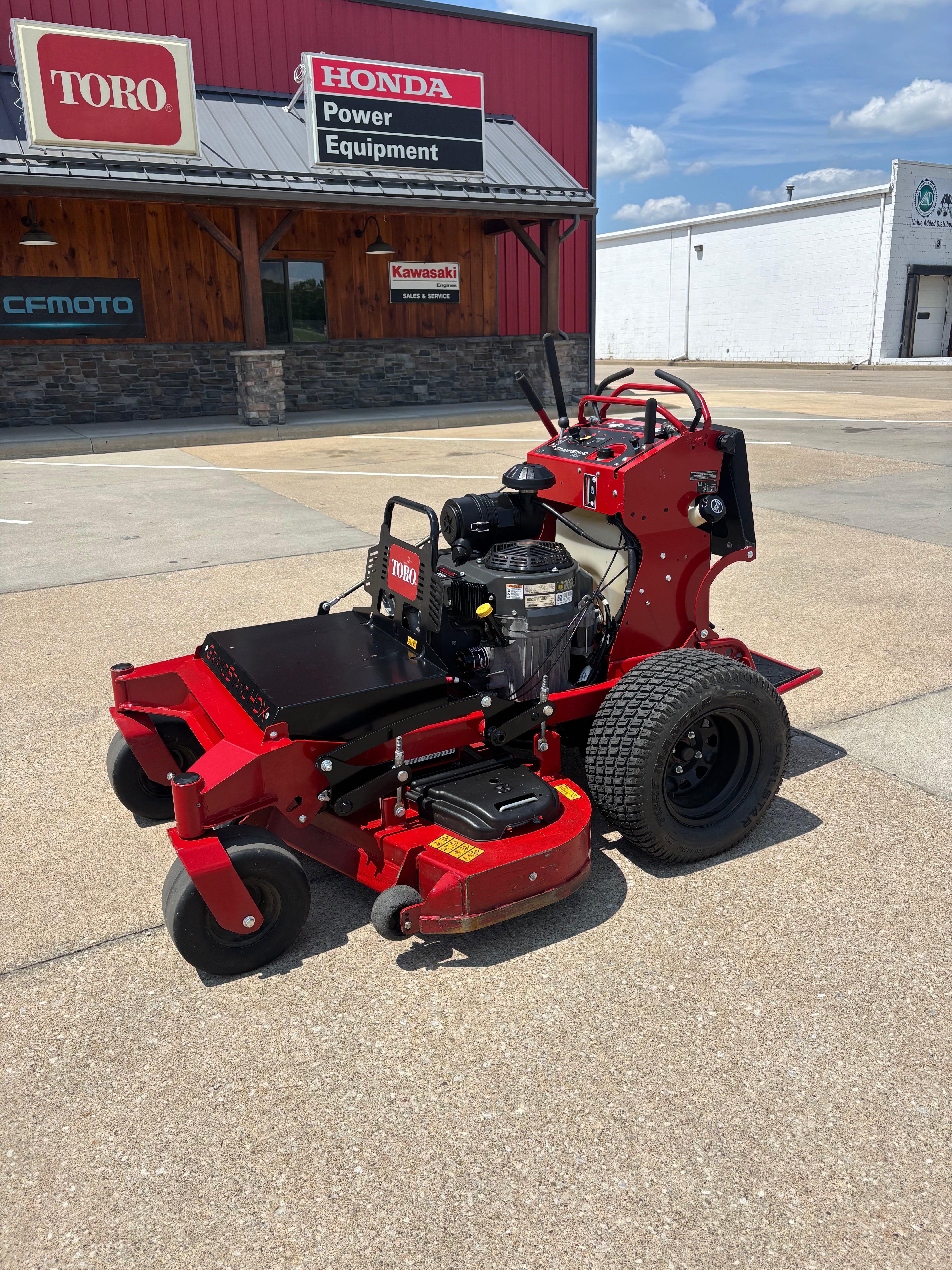 Used Toro Grandstand HDX 52-inch stand on mower