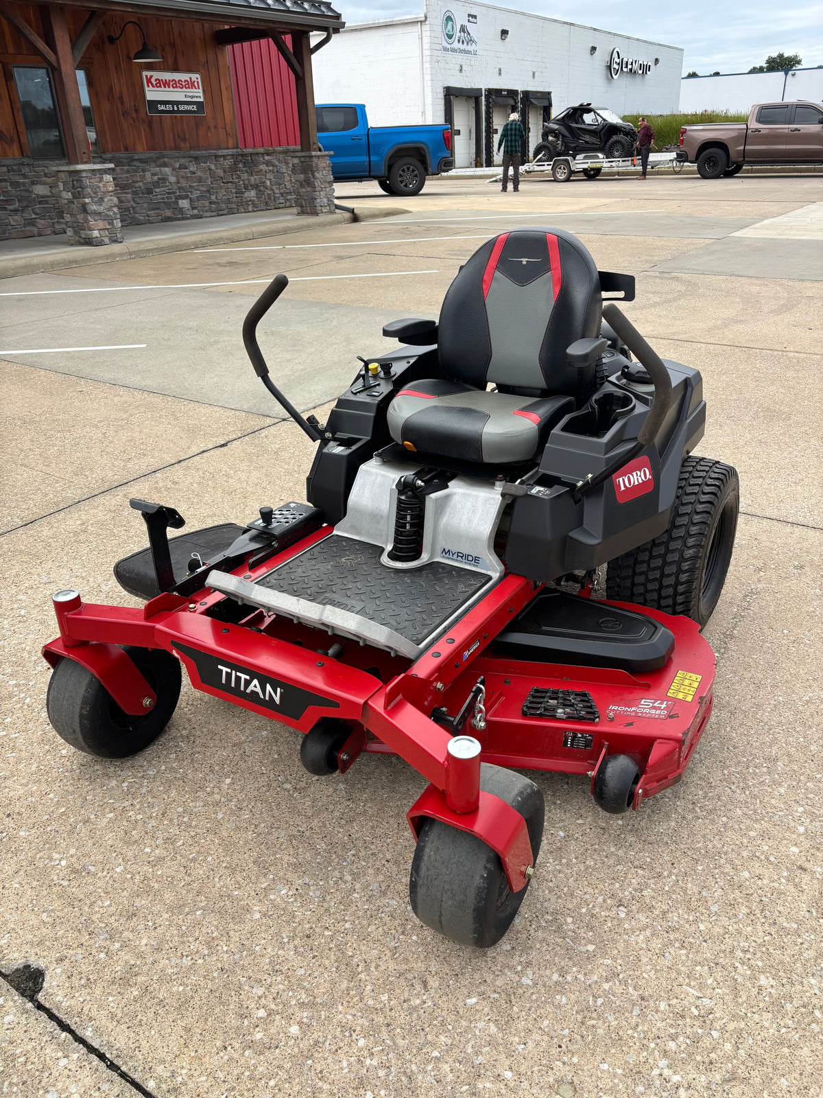 Used Toro Titan 54-inch zero-turn mower.