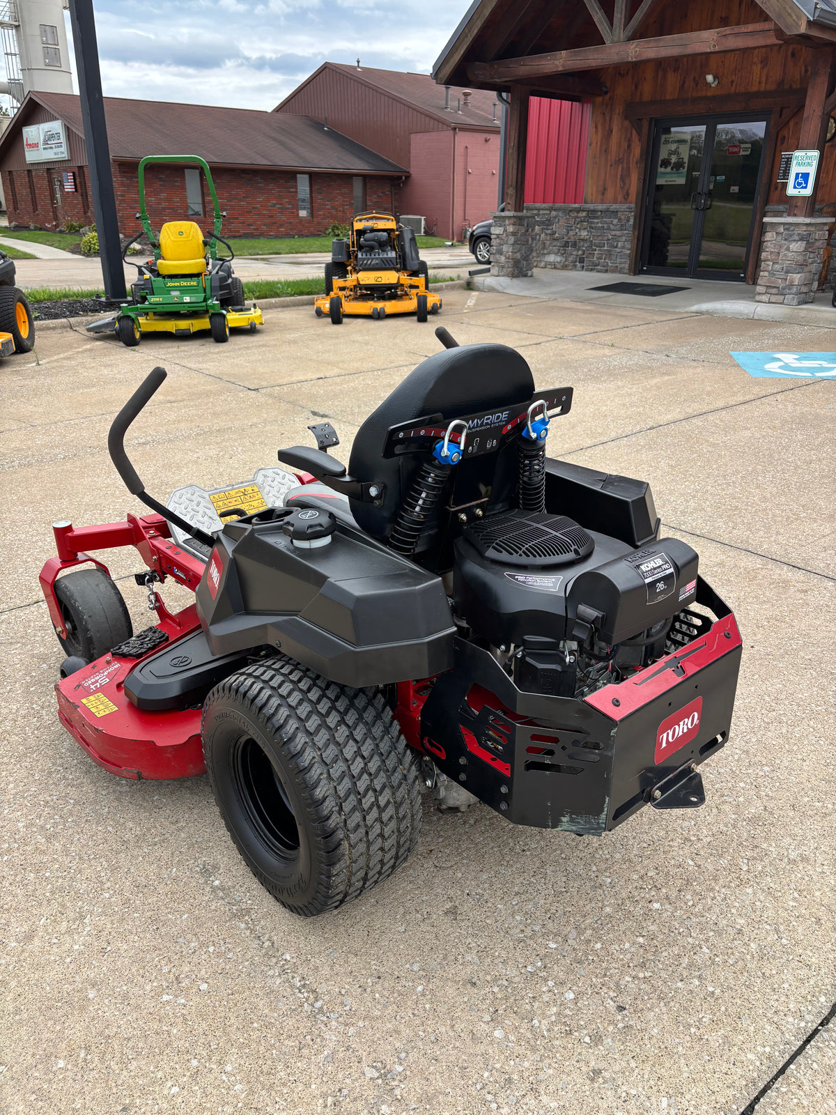 Used Toro Titan 54-inch zero-turn mower.
