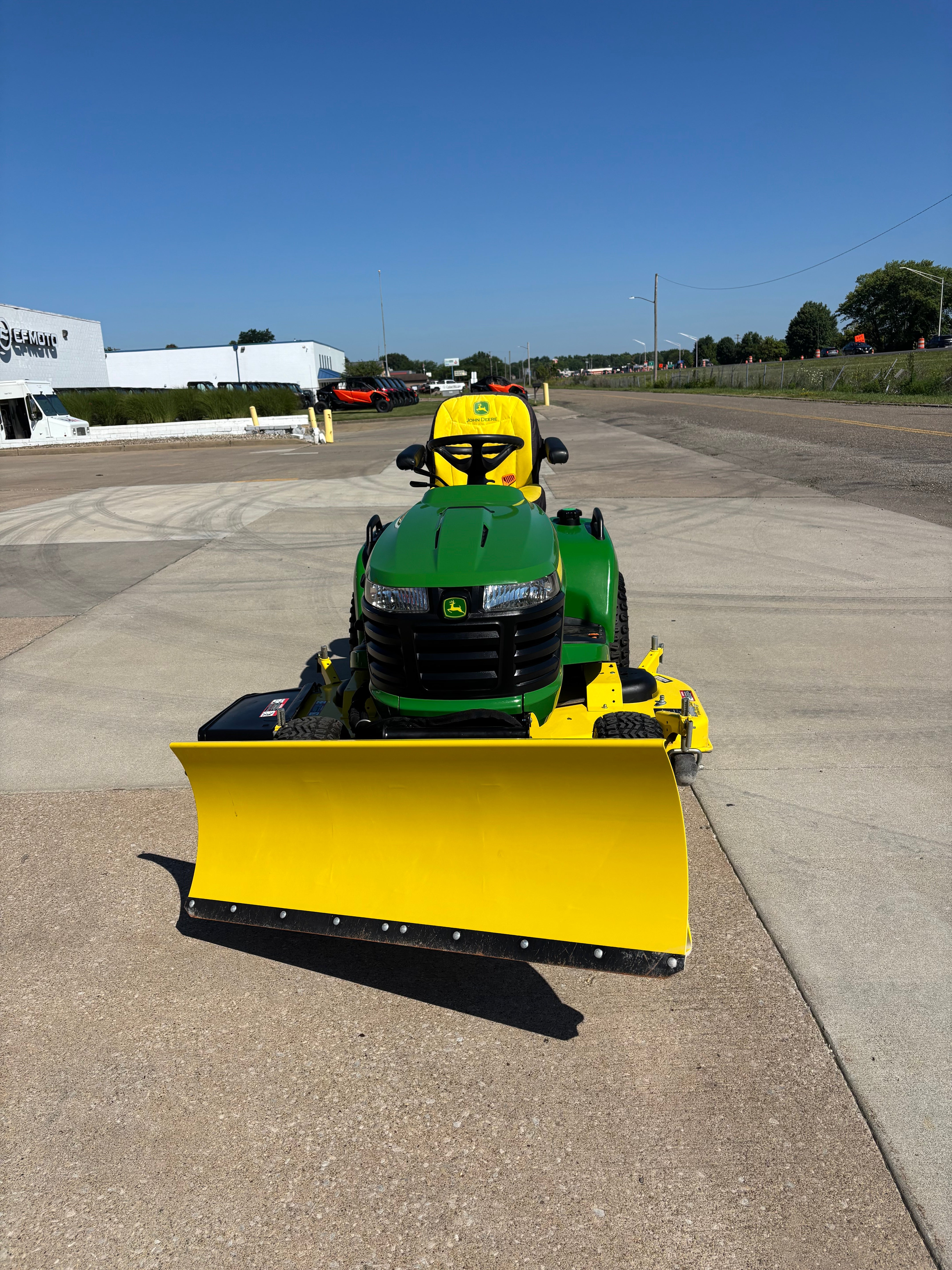 Used John Deere X758 four-wheel drive tractor