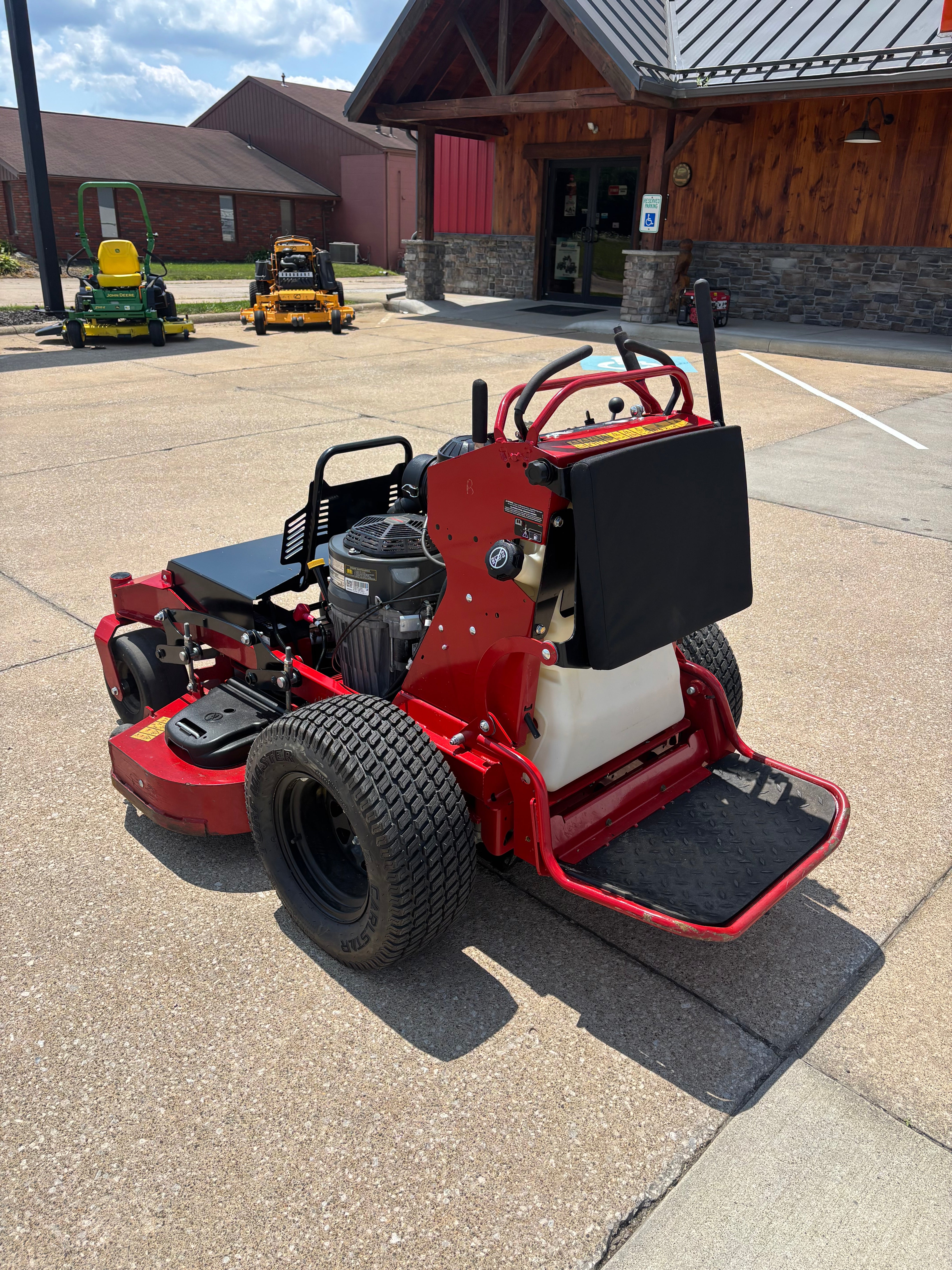 Used Toro Grandstand HDX 52-inch stand on mower