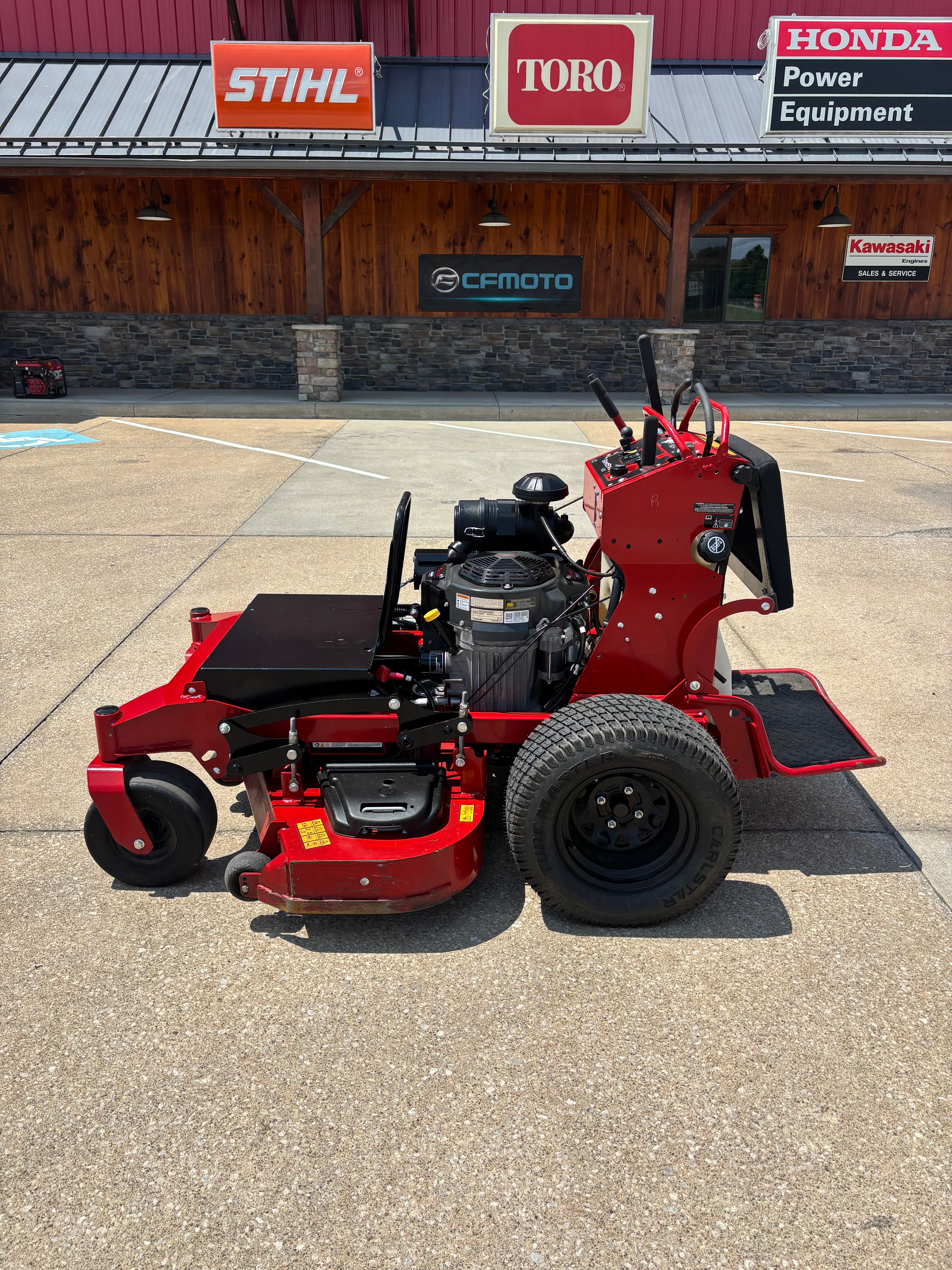 Used Toro Grandstand HDX 52-inch stand on mower