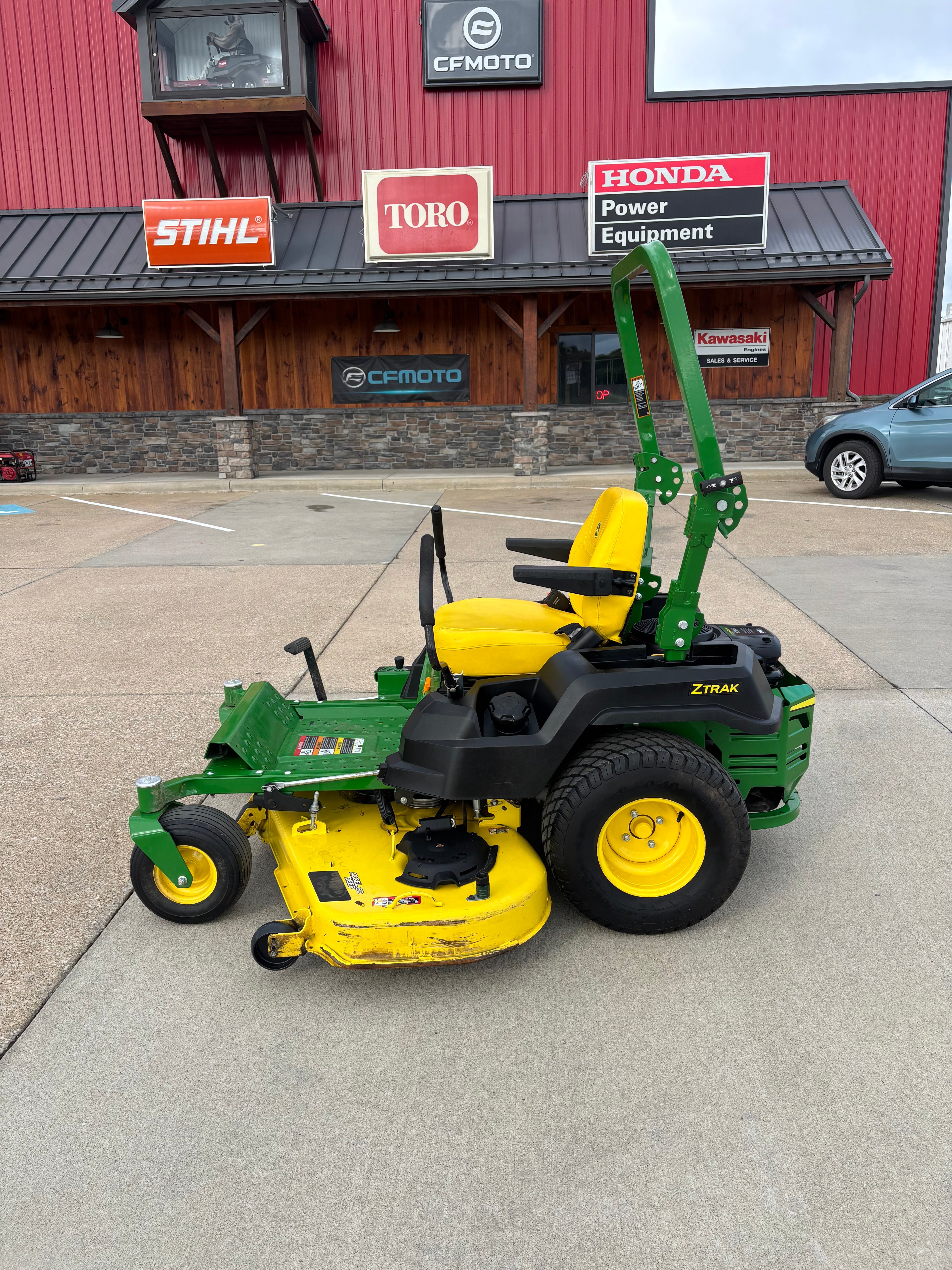 Used John Deere 60-inch zero-turn mower.