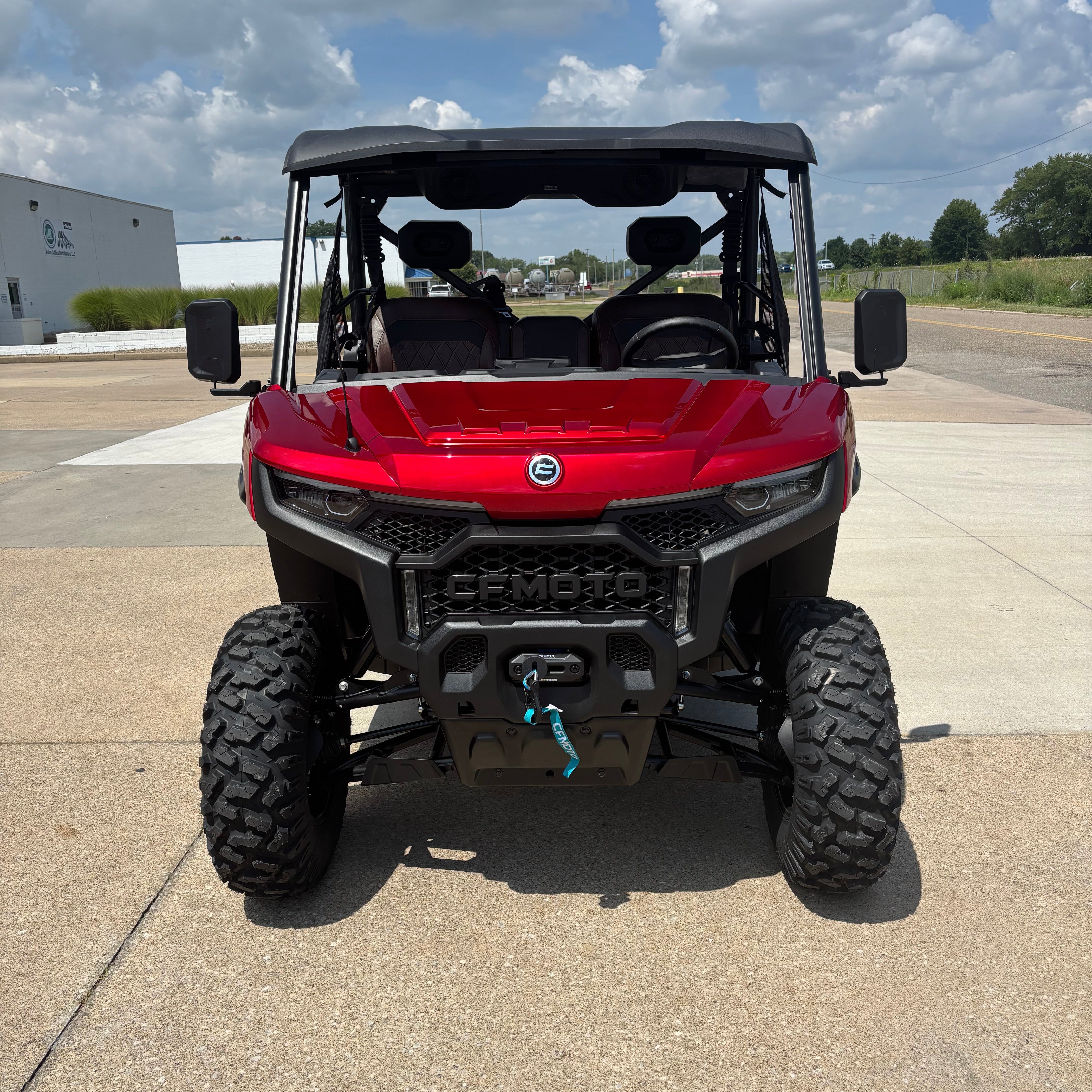 Cfmoto u10 side by side in a dealership parking lot for sale